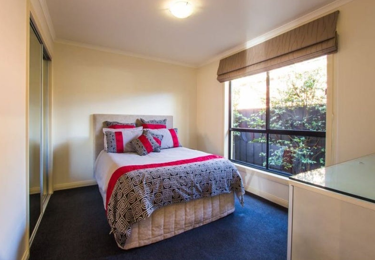 Spacious bedroom with private ensuite available in a modern SIL home in Newstead — Home image 8